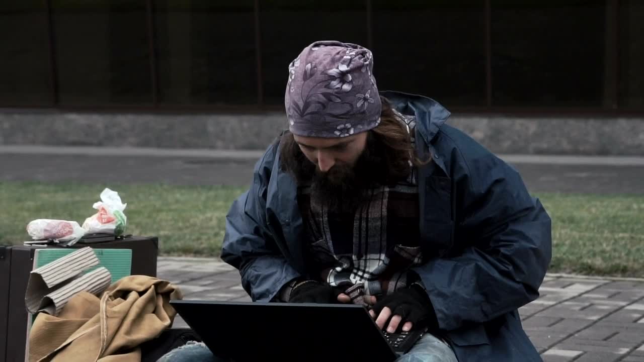 Stock Video Homeless Gets Good News On The Computer Animated Wallpaper
