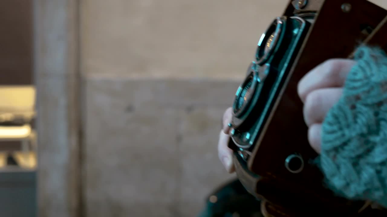 Stock Video Holding An Old Camera Animated Wallpaper