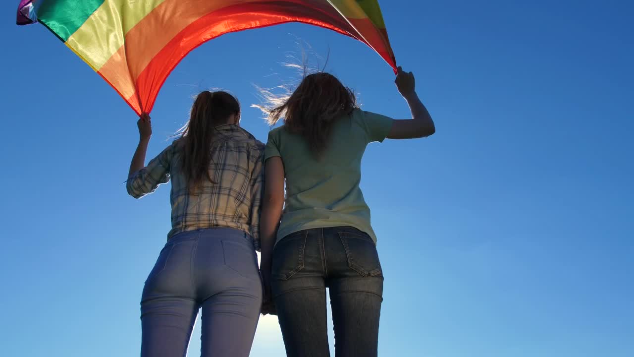 Stock Video Holding A Rainbow Flag In The Wind Animated Wallpaper