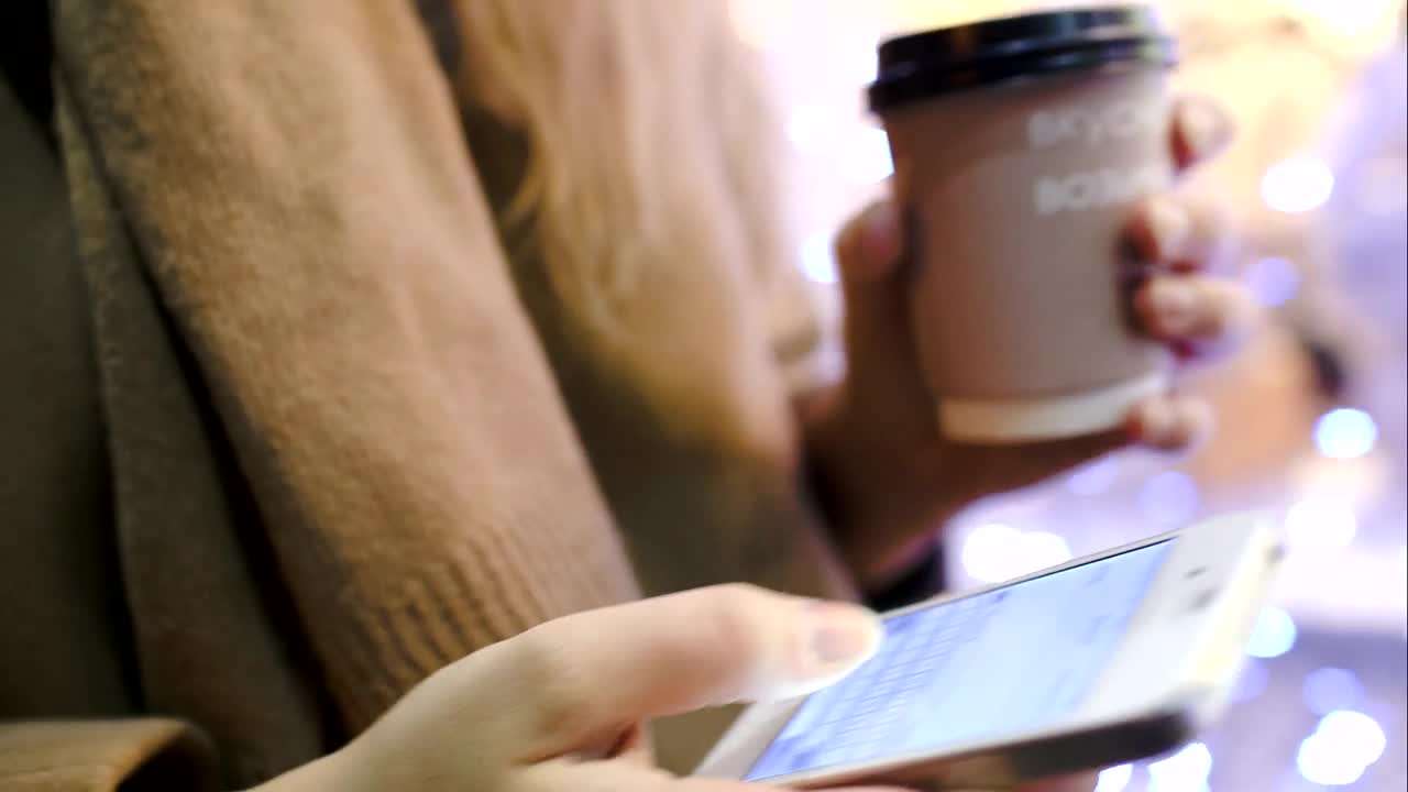 Stock Video Holding A Coffee And Texting Animated Wallpaper