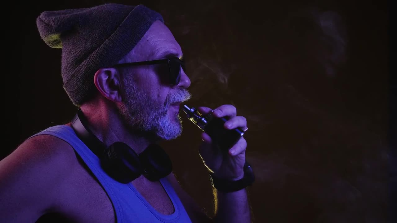 Stock Video Hipster Mature Man Vaping Animated Wallpaper