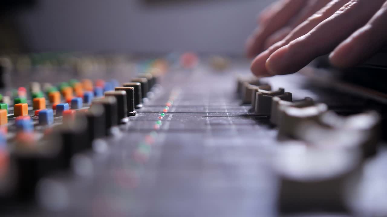 Stock Video Hiphop Producer Using A Mixing Console Animated Wallpaper