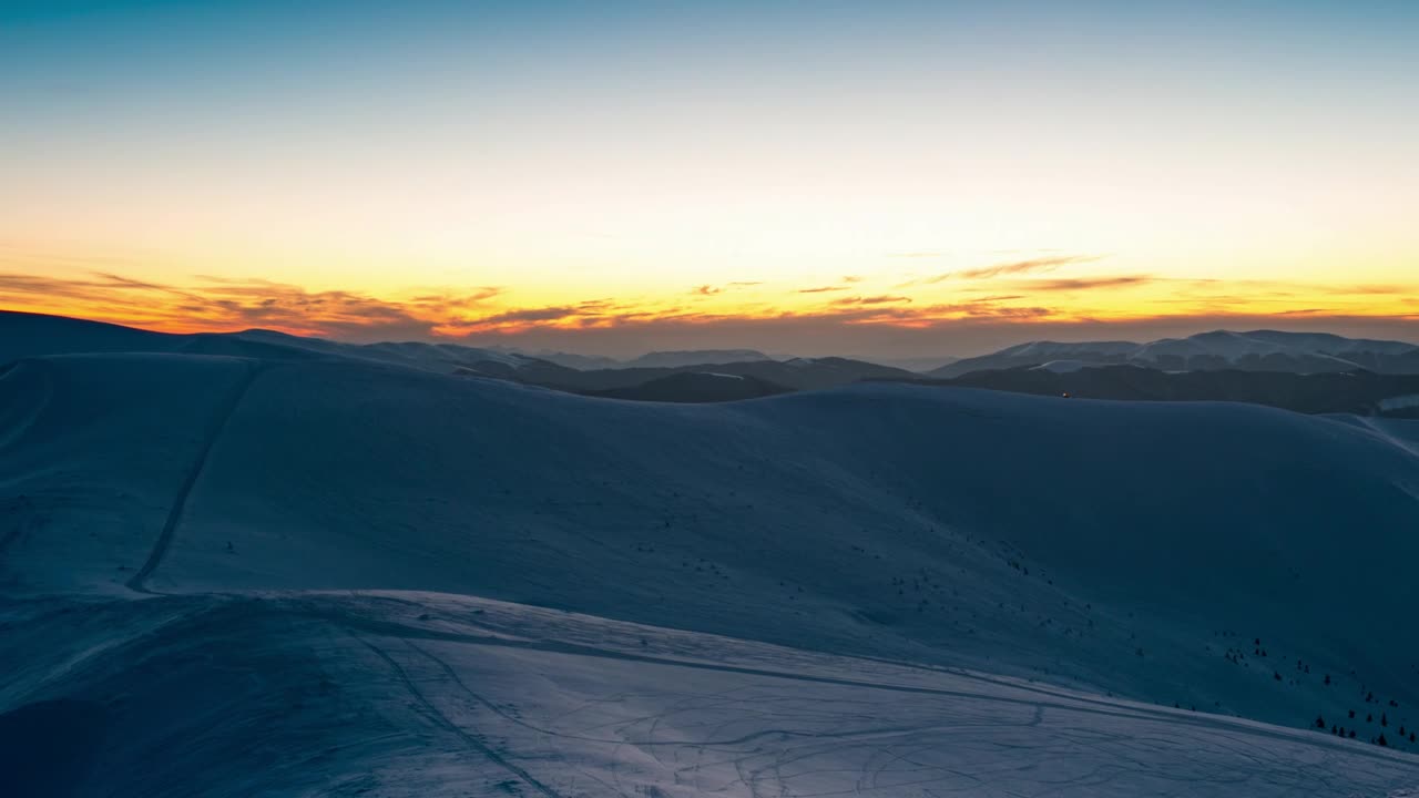 Stock Video Hill Covered With Snow During A Sunrise Animated Wallpaper