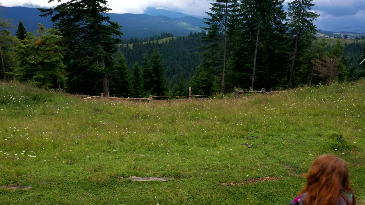Stock Video Hiker Woman Walking In The Mountain Forest Animated Wallpaper