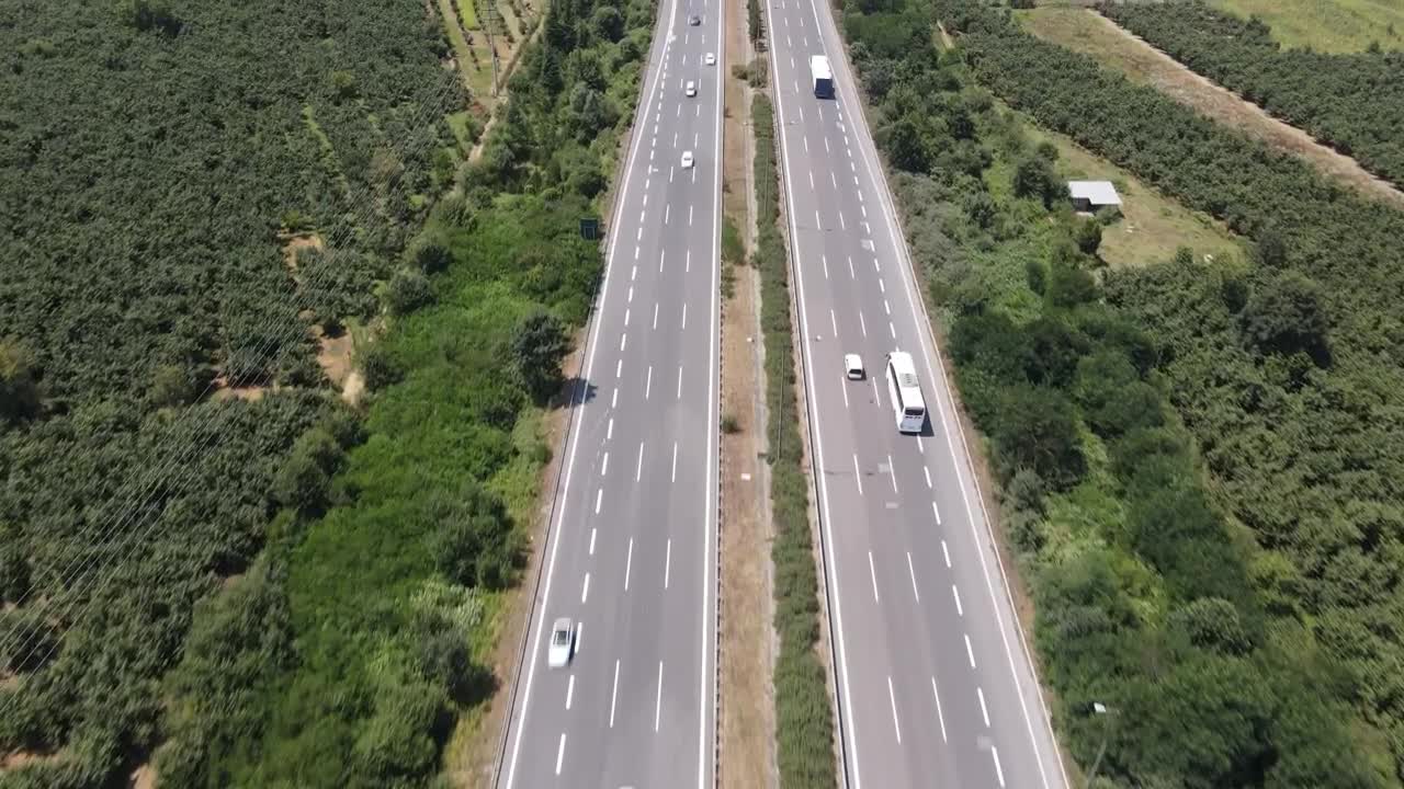 Stock Video Highway With Cars Surrounded By Vegetation Animated Wallpaper