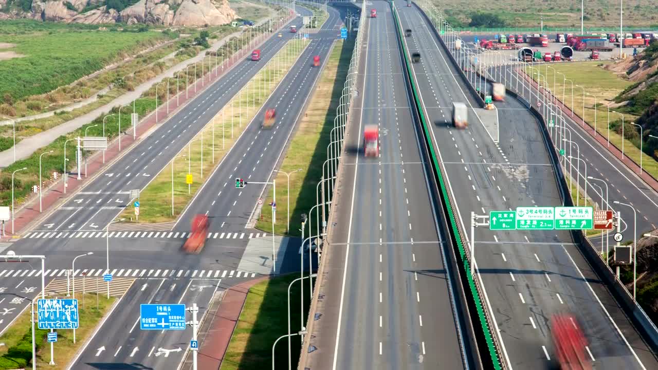 Stock Video Highway With Cars And Trucks During A Sunny Day Animated Wallpaper