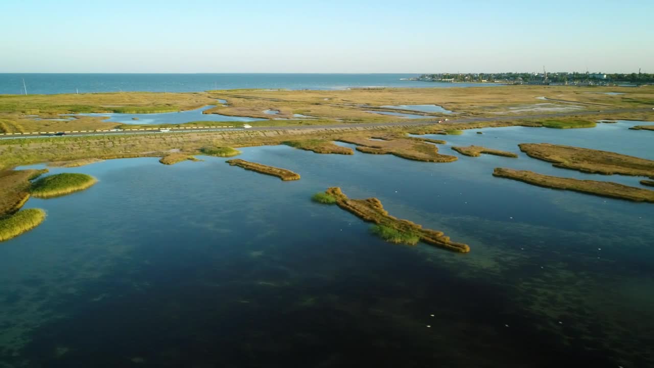 Stock Video Highway That Crosses A Rough Lake Seen From Above Animated Wallpaper