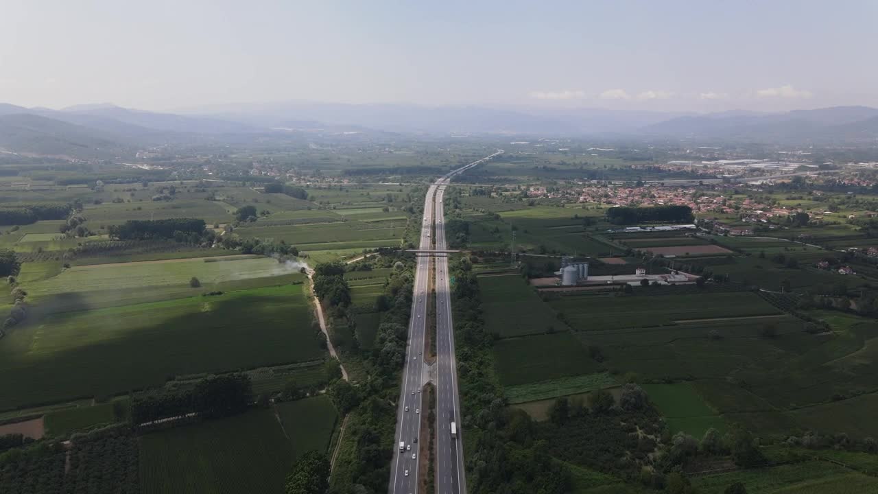 Stock Video Highway Between Large Green Fields From Very High Animated Wallpaper