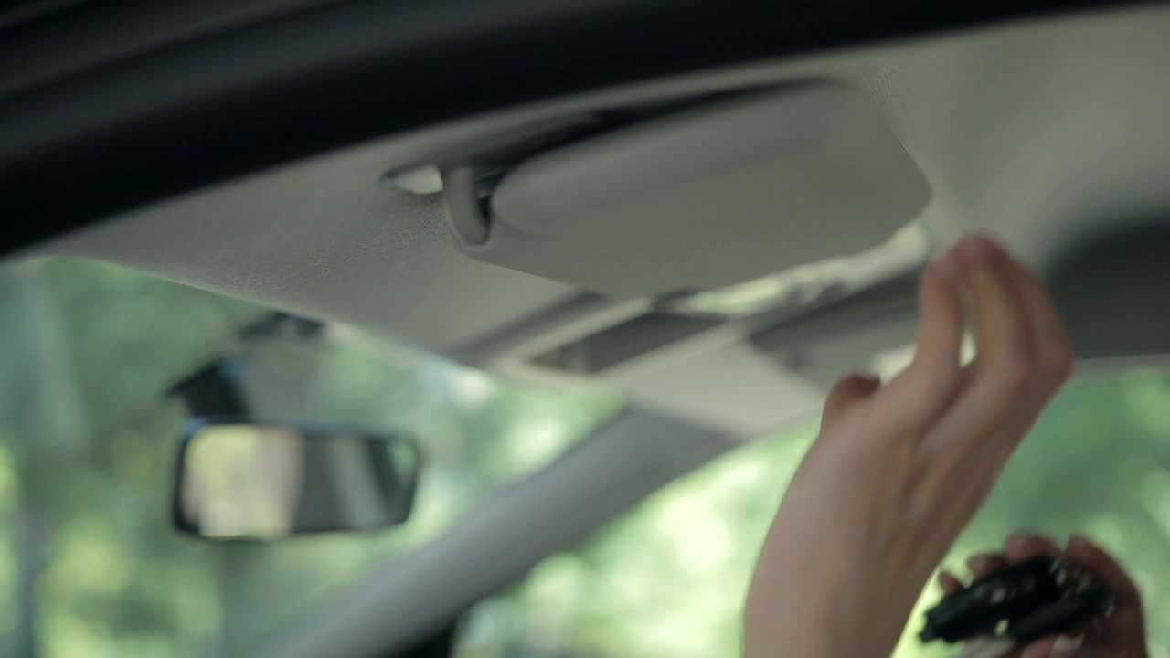 Stock Video Hiding Car Keys In The Sun Visor Animated Wallpaper
