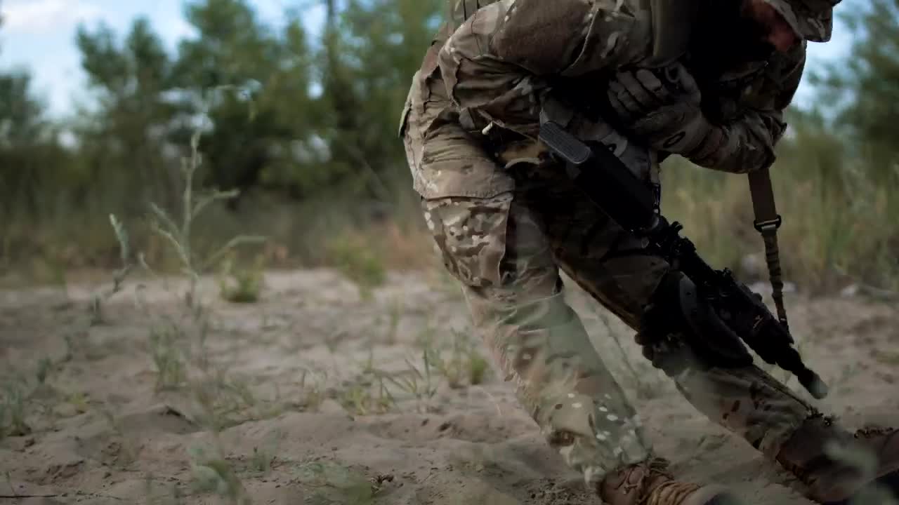Stock Video Helping The Wounded Soldier Animated Wallpaper