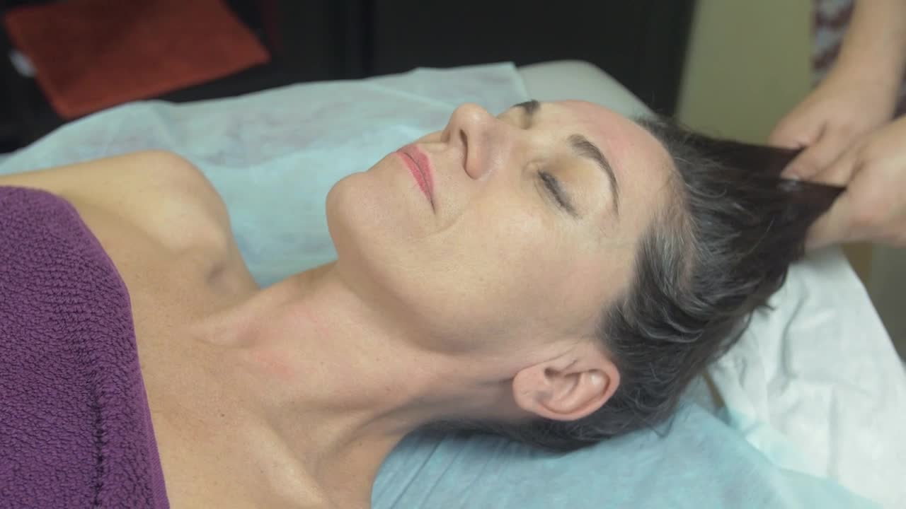 Stock Video Head Massage By A Masseuse Animated Wallpaper