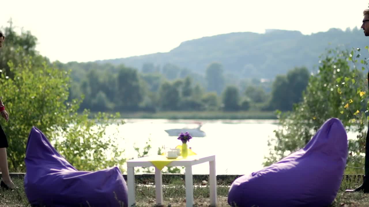 Stock Video Having A Meeting By The Lake Animated Wallpaper