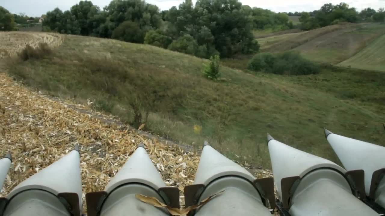 Stock Video Harvester Moving Through A Finished Field Animated Wallpaper