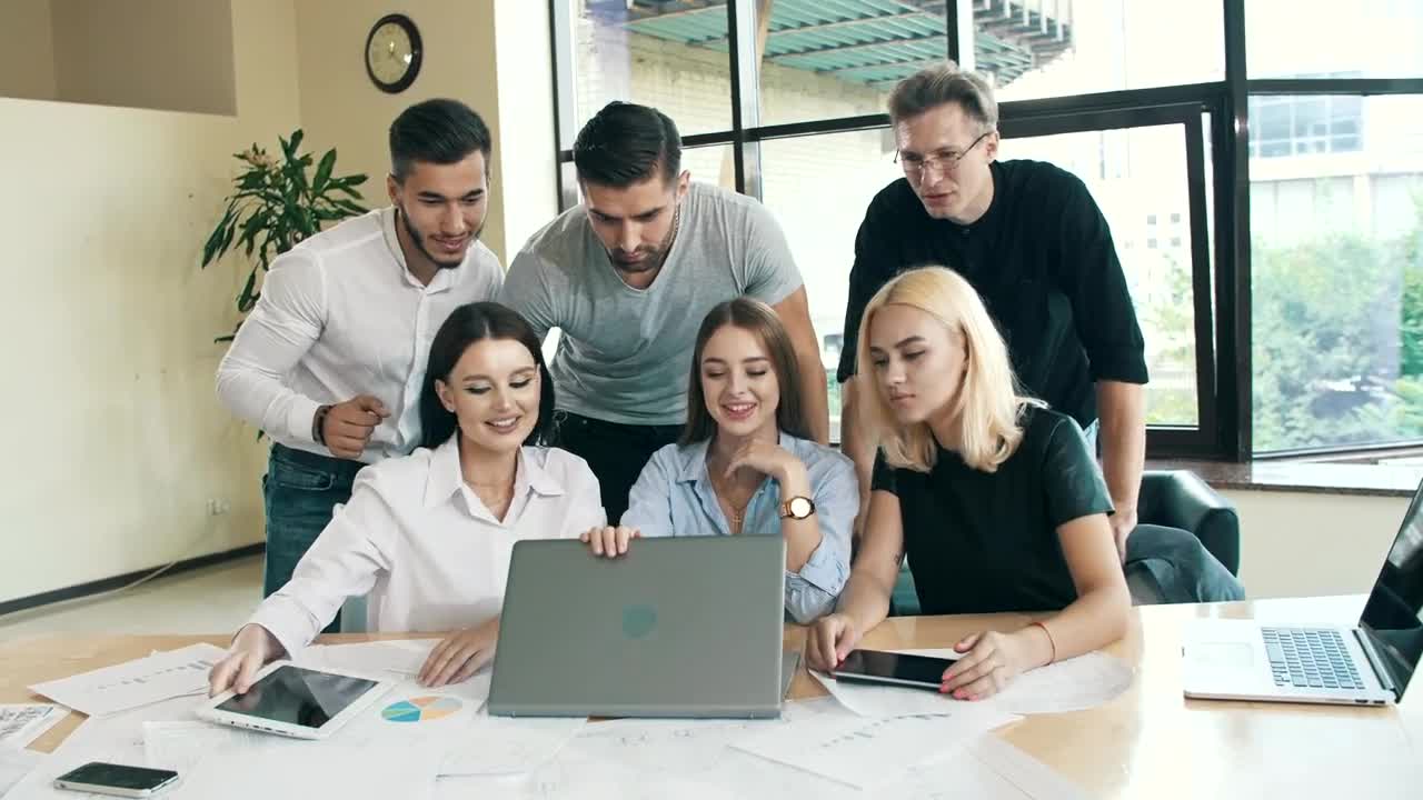 Stock Video Happy Workgroup For Successfully Closing A Deal Animated Wallpaper