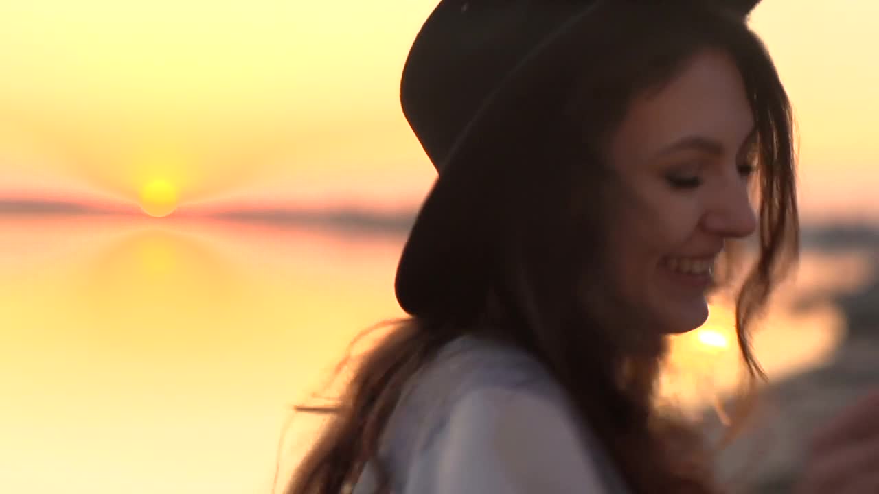 Stock Video Happy Woman With Sparklers At Sunset Animated Wallpaper