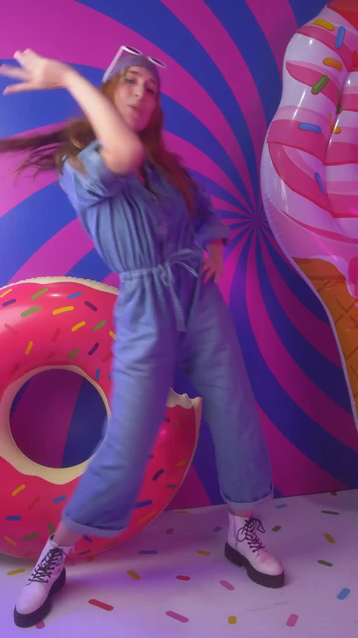 Stock Video Happy Woman Dancing Happily In A Colorful Spot Animated Wallpaper