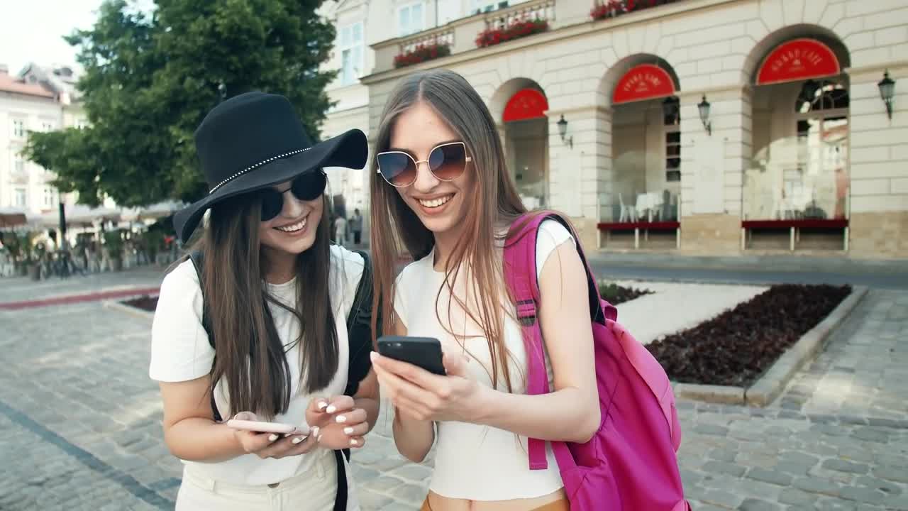 Stock Video Happy Tourist Girls Taking Photos Of Rome Street Animated Wallpaper