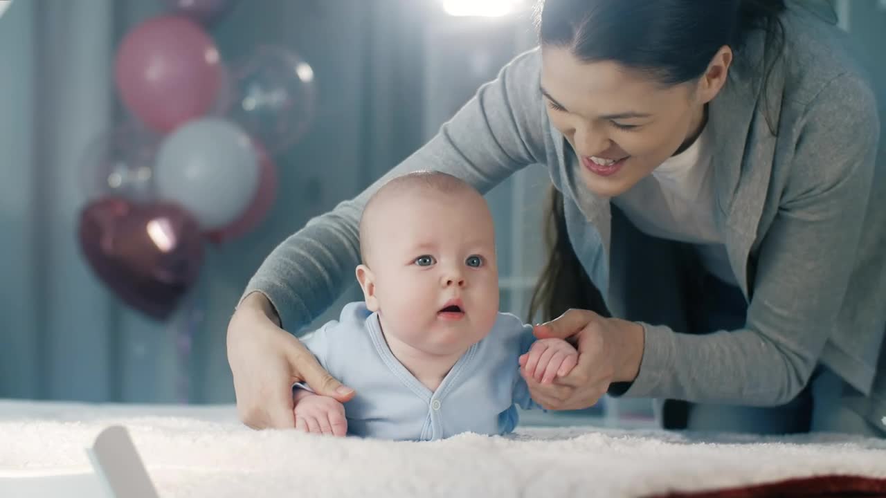 Stock Video Happy Mother Kisses Her Little Baby Animated Wallpaper