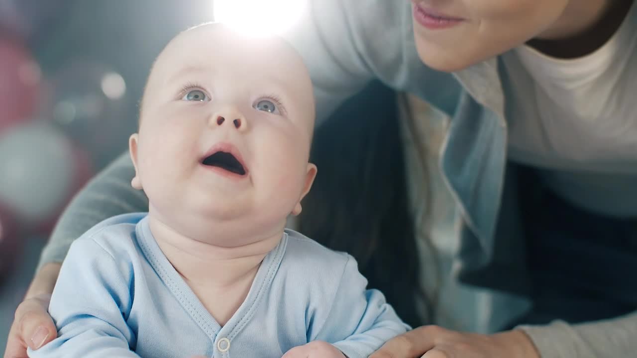 Stock Video Happy Mom Kisses Her Son On The Cheek Animated Wallpaper