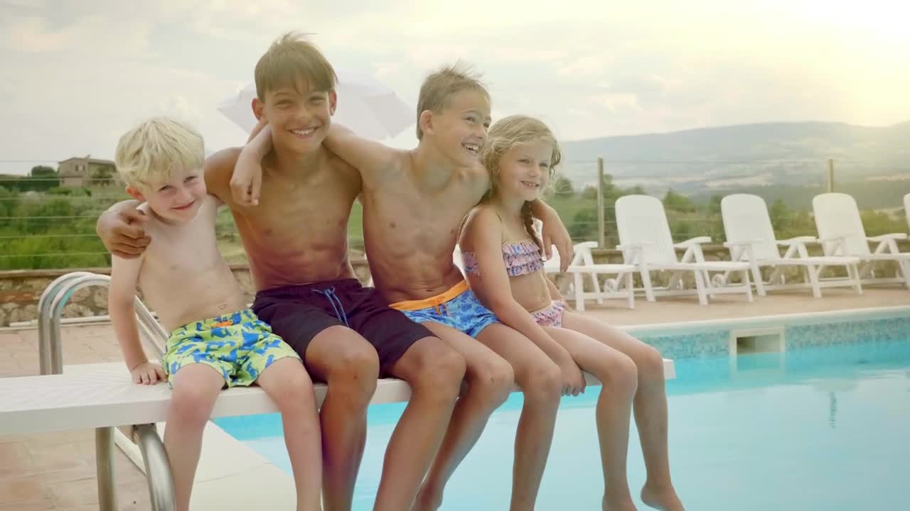 Stock Video Happy Kids Outside The Pool Animated Wallpaper