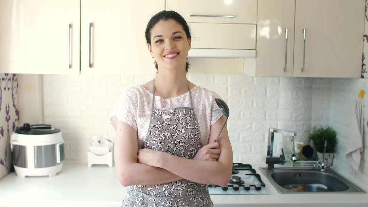 Stock Video Happy Housewife In The Kitchen Animated Wallpaper