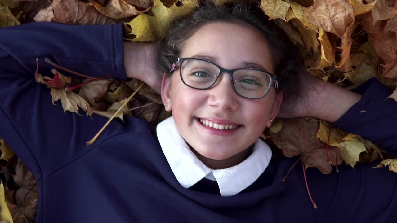 Stock Video Happy Girl Smiling In The Autumn Animated Wallpaper