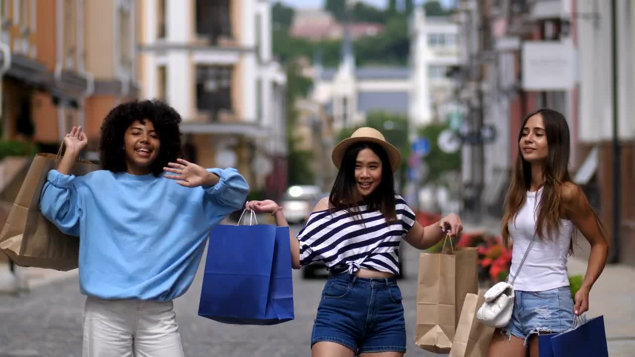 Stock Video Happy Friends Partying On A Shopping Day Animated Wallpaper