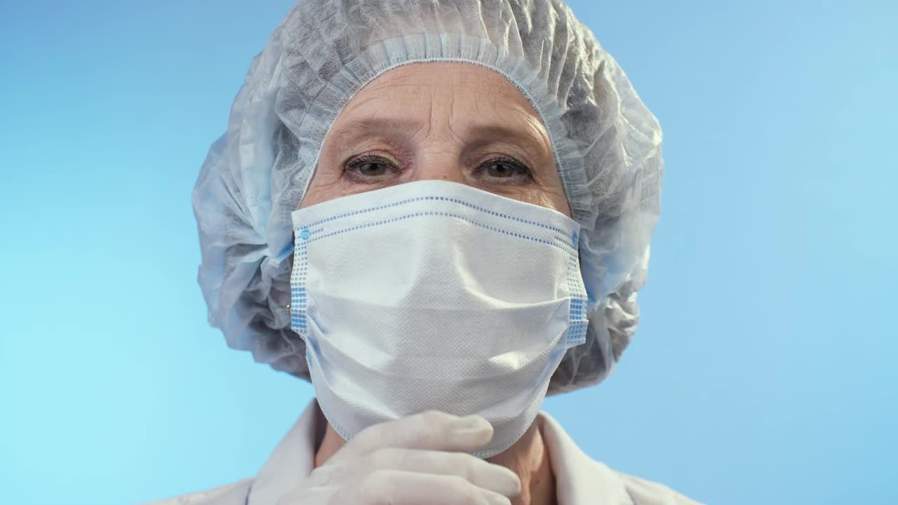 Stock Video Happy Doctor Takes Off The Mask Animated Wallpaper