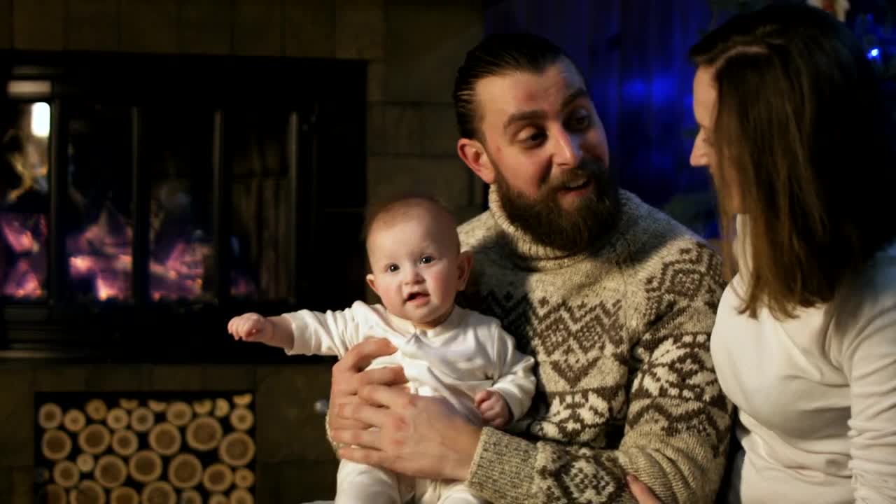 Stock Video Happy Couple With Newborn Kissing Animated Wallpaper