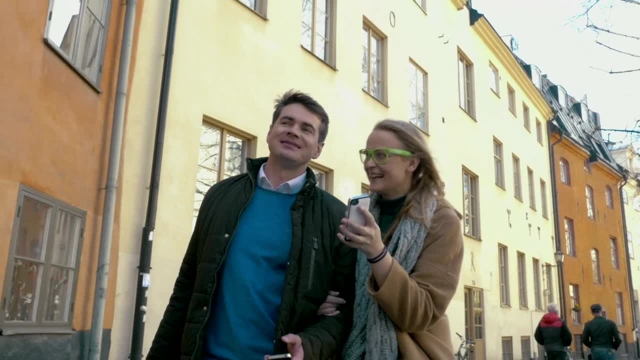 Stock Video Happy Couple Talking While Out For A Walk Animated Wallpaper