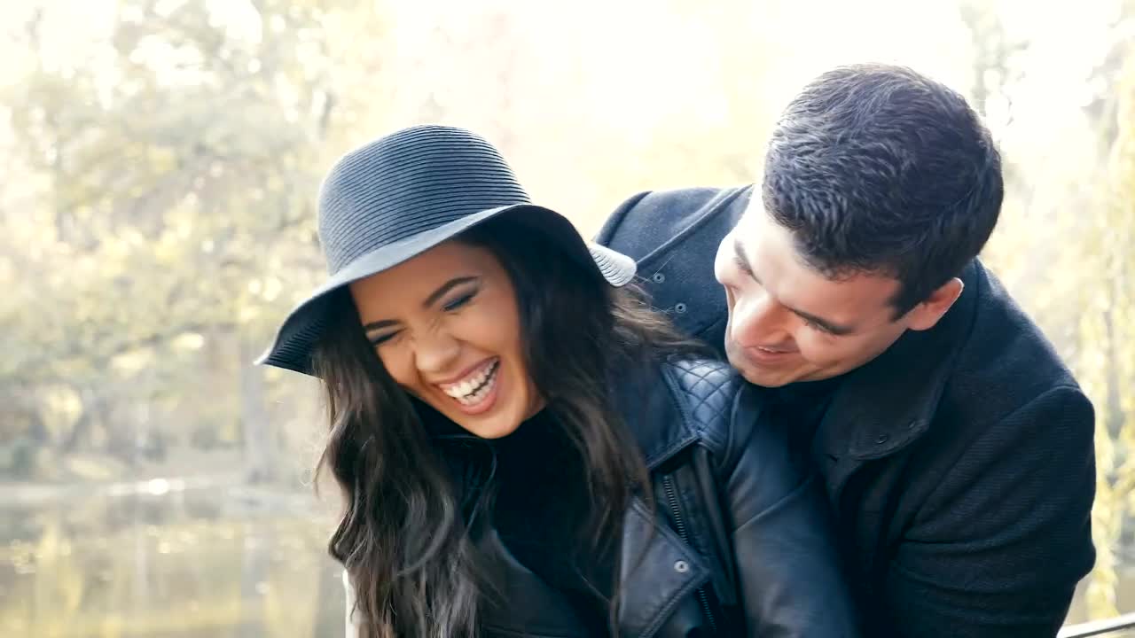 Stock Video Happy Couple Hugging In The Park Animated Wallpaper