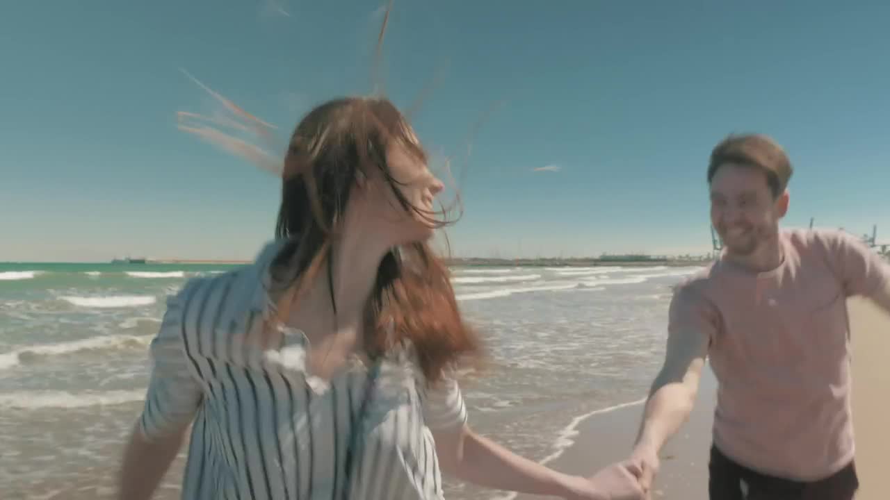 Stock Video Happy Couple Holding Hands While Running Animated Wallpaper