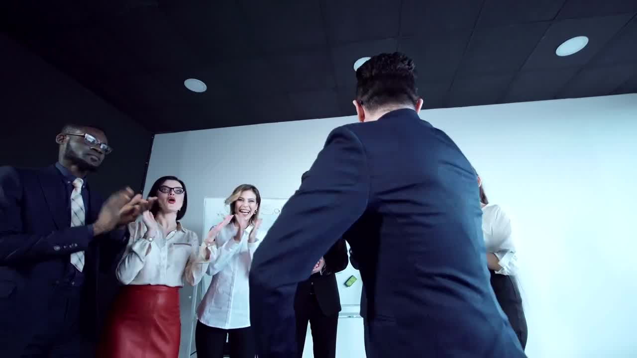 Stock Video Happy Business Team Cheering And Clapping Animated Wallpaper