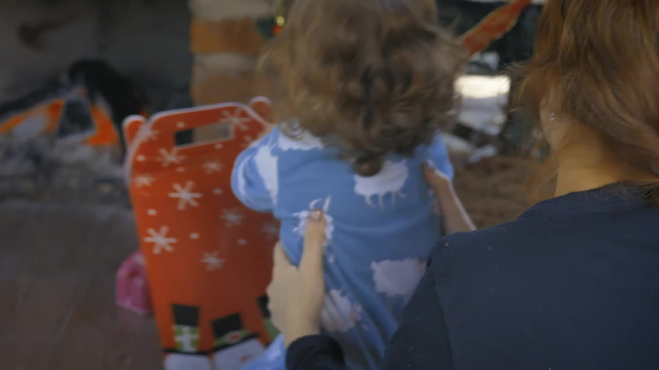 Stock Video Happy And Excited Girl With A Stuffed Santa Claus Animated Wallpaper