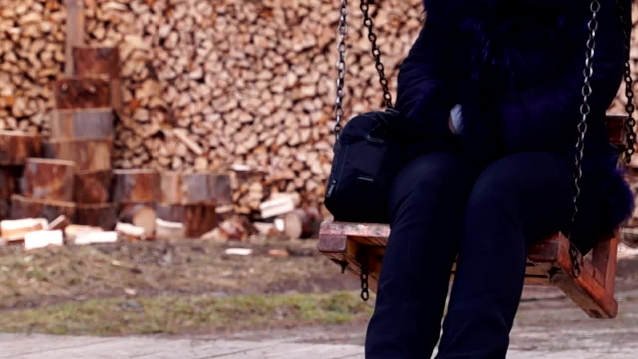 Stock Video Hanging Out On A Wooden Swing Animated Wallpaper