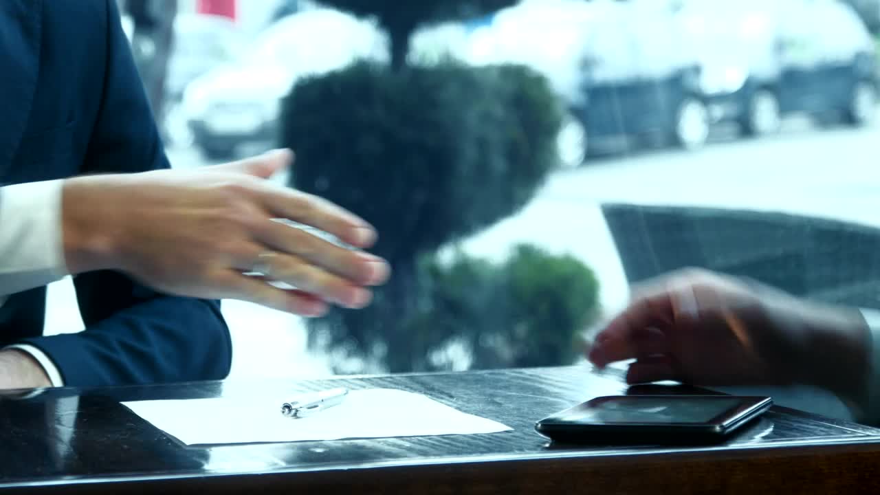 Stock Video Handshake Over The Contract Animated Wallpaper