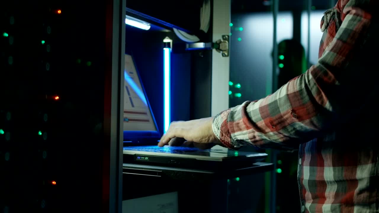Stock Video Hands Working With Laptop In Datacenter Animated Wallpaper