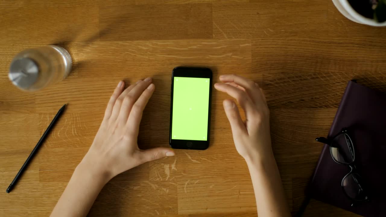 Stock Video Hands Using Mobile Phone On The Desk Animated Wallpaper