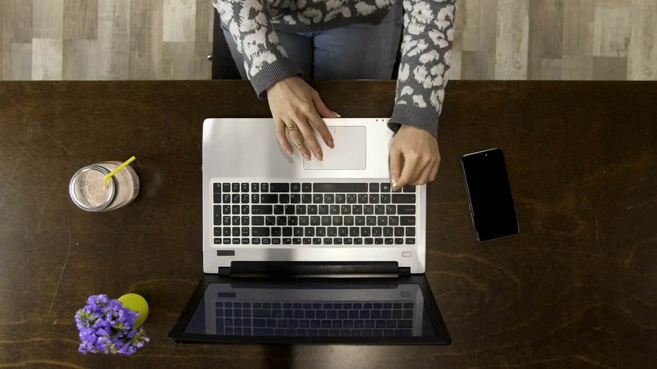 Stock Video Hands Typing On A Laptop Top Shot Animated Wallpaper
