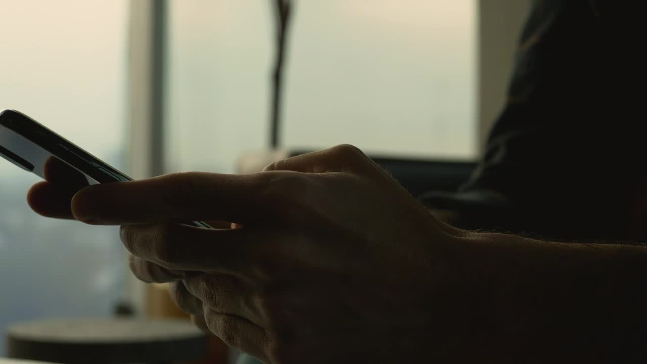 Stock Video Hands Shown Texting On A Smartphone Animated Wallpaper