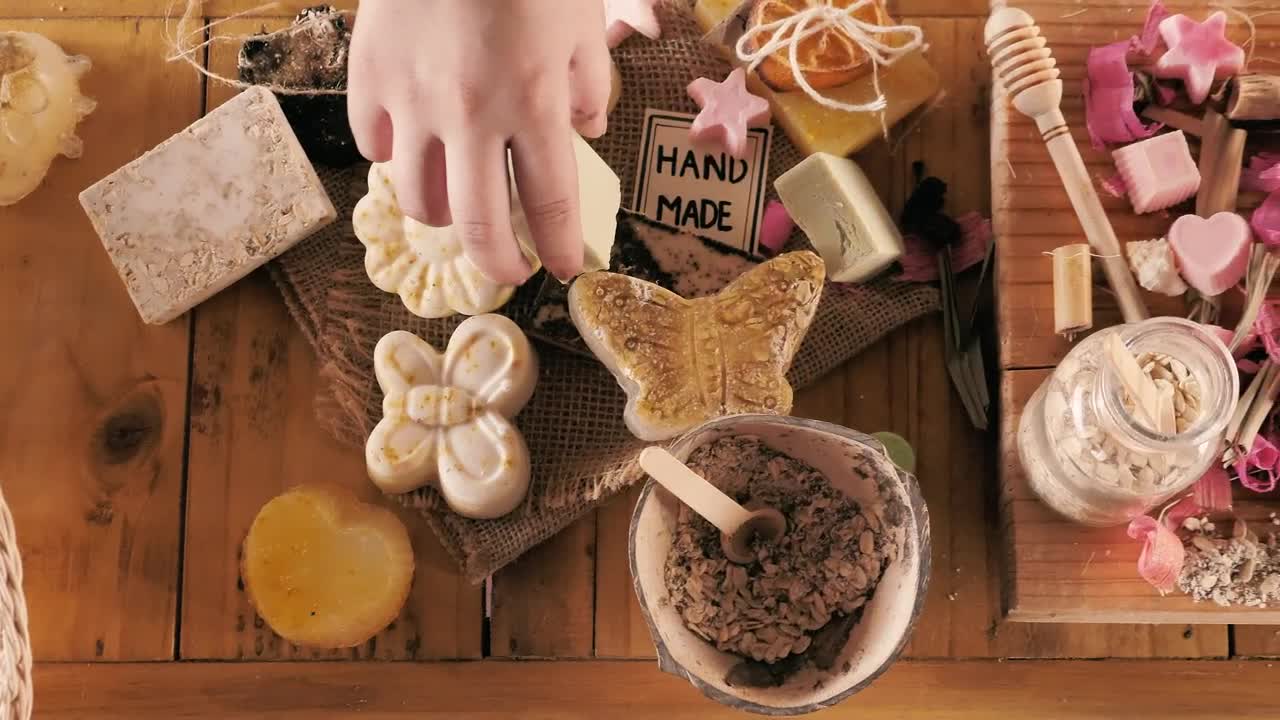 Stock Video Hands Selecting And Packaging Handmade Soaps Animated Wallpaper