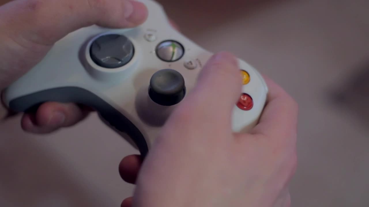 Stock Video Hands Playing With A Video Game Controller Animated Wallpaper