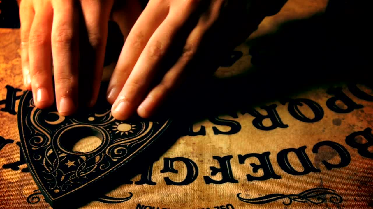Stock Video Hands Playing Ouija Board Animated Wallpaper