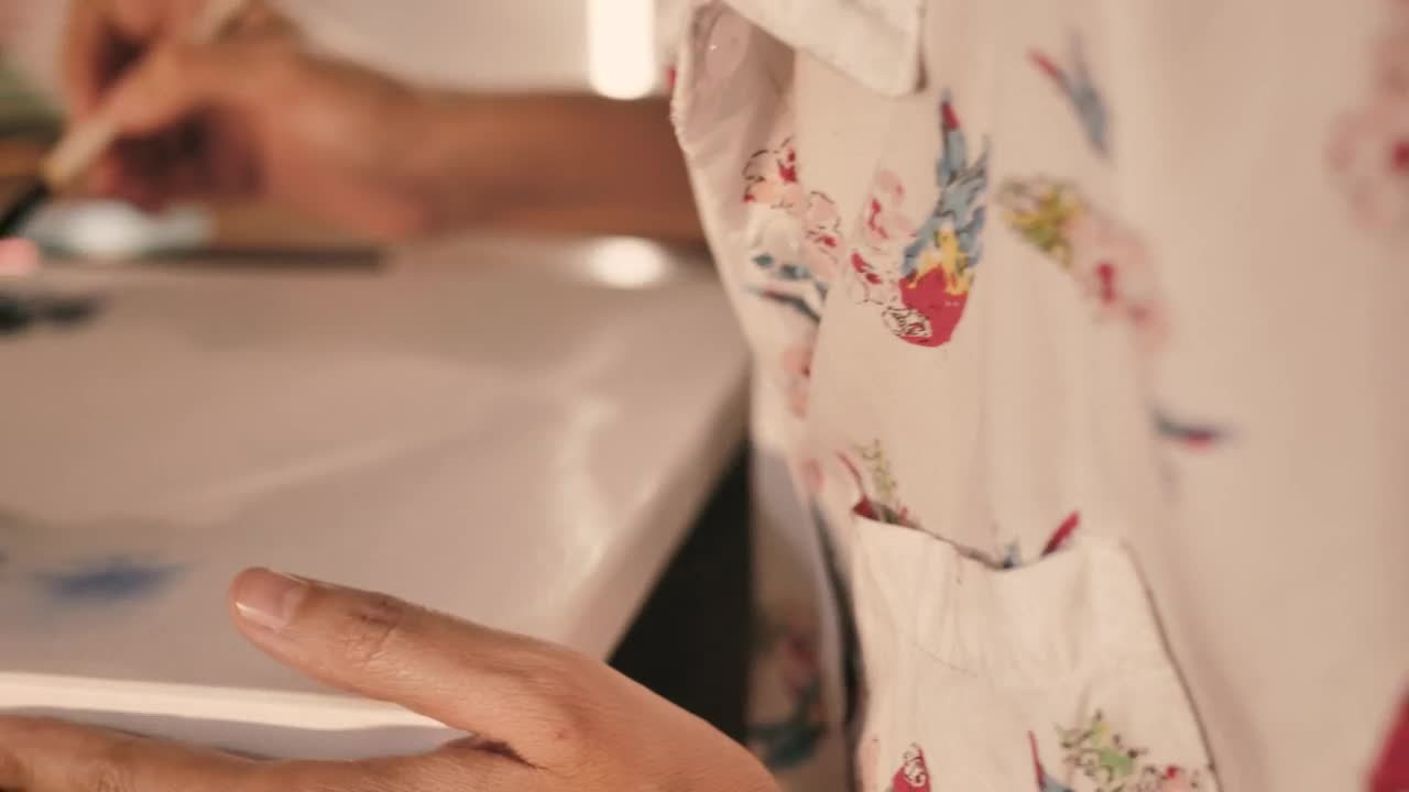 Stock Video Hands Painting With Watercolors Close Up Animated Wallpaper