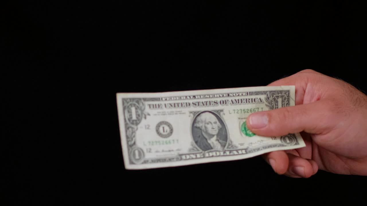 Stock Video Hands Of People During A Money Transaction Animated Wallpaper