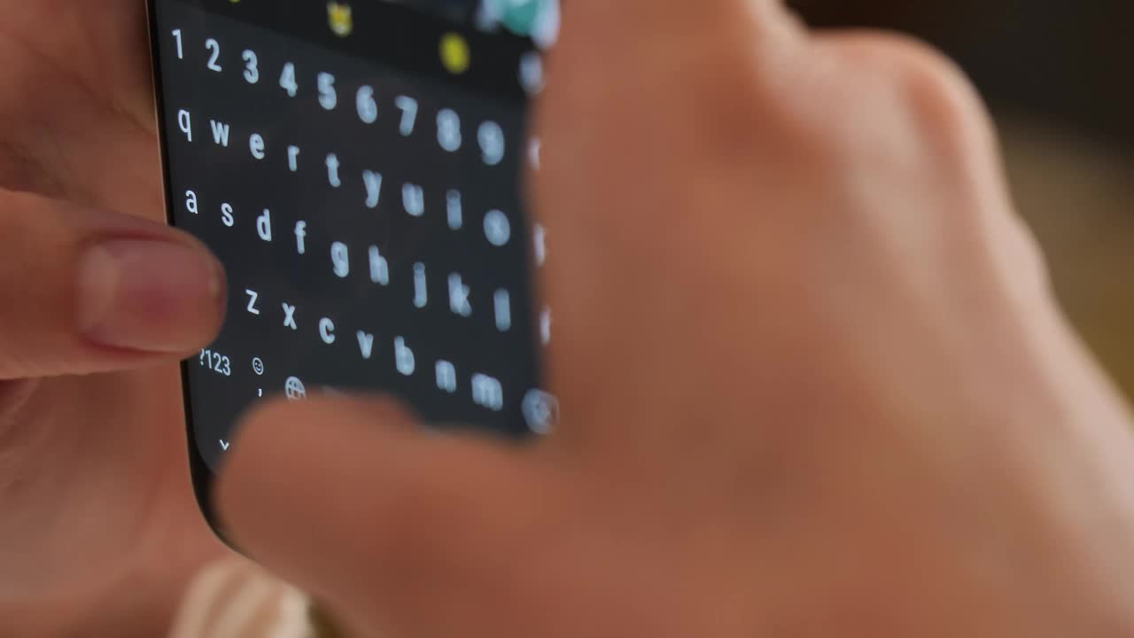 Stock Video Hands Of A Young Woman Typing On Her Smartphone Animated Wallpaper