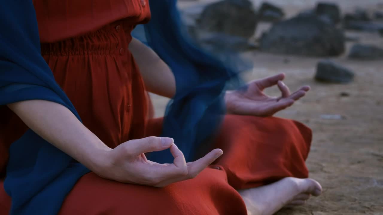 Stock Video Hands Of A Woman Yoga Position On The Land Of Animated Wallpaper