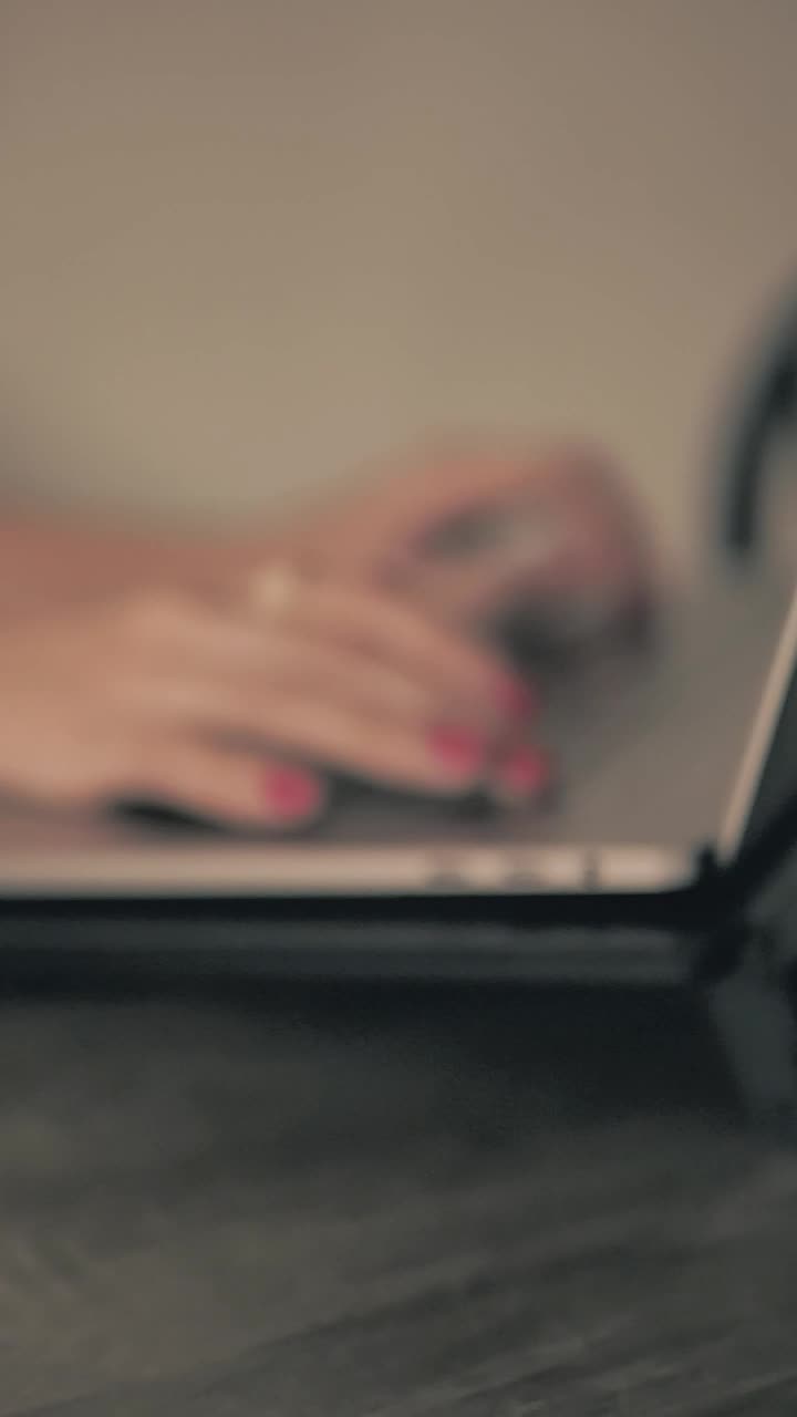 Stock Video Hands Of A Woman Typing On A Laptop Animated Wallpaper