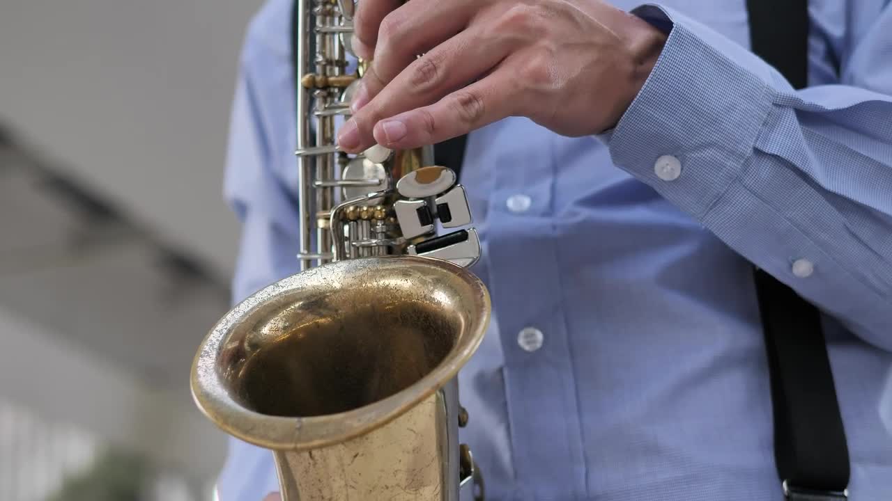Stock Video Hands Of A Saxophonist Playing A Song Animated Wallpaper