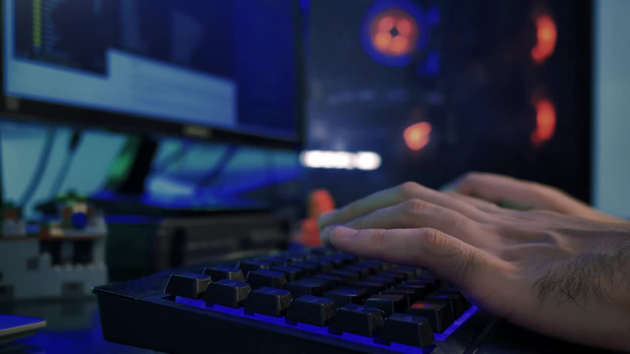 Stock Video Hands Of A Programmer Working On His Computer Animated Wallpaper